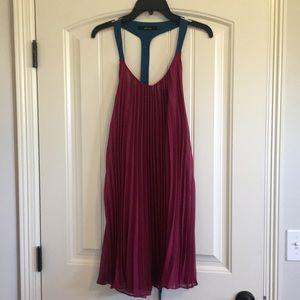NWOT- Never worn. Perfect going out dress! Flirty!